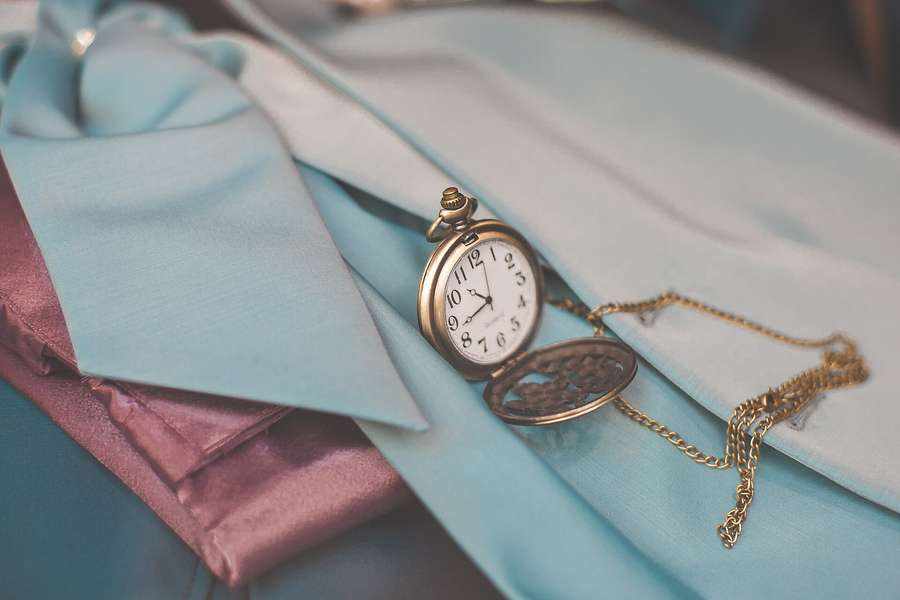 An antique pocket watch - overtime begins after 8 hours a day or an average 40 hours a week